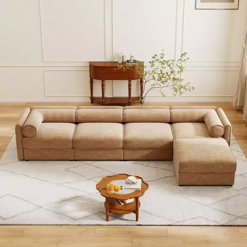 Canapé modulable avec rangement, dossier cylindrique et accoudoirs, assise profonde et confortable, durable et offrant un bon soutien pour le salon.