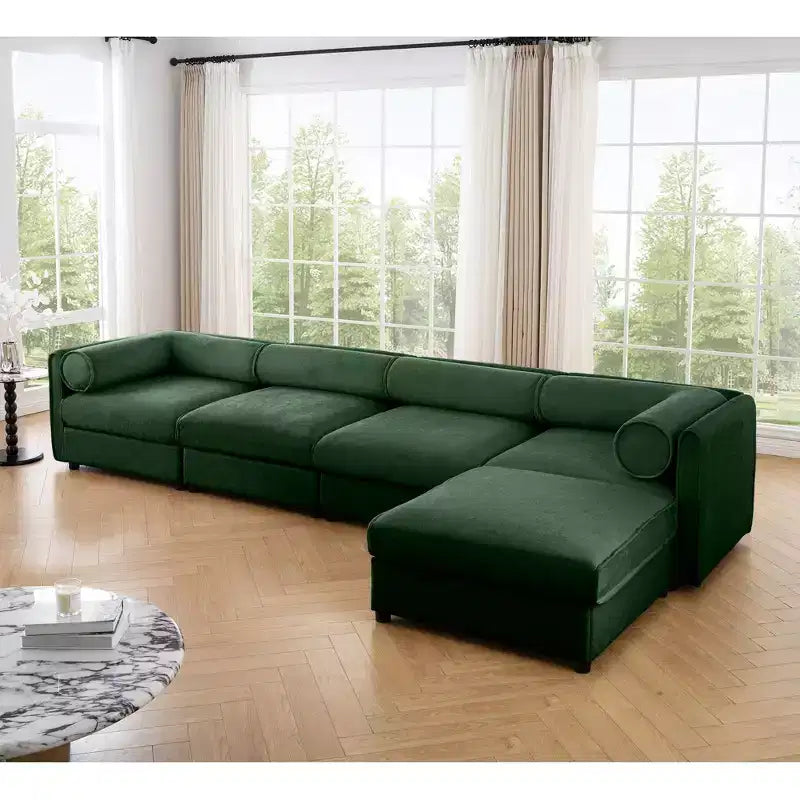 Canapé modulable avec rangement, dossier cylindrique et accoudoirs, assise profonde et confortable, durable et offrant un bon soutien pour le salon.