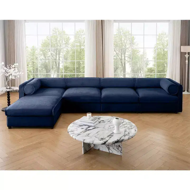 Canapé modulable avec rangement, dossier cylindrique et accoudoirs, assise profonde et confortable, durable et offrant un bon soutien pour le salon.