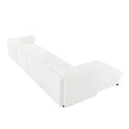 Canapé modulable avec rangement, dossier cylindrique et accoudoirs, assise profonde et confortable, durable et offrant un bon soutien pour le salon.