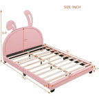 Lit plateforme rembourré en cuir pleine grandeur avec tête de lit à oreilles et ornement de lapin pour enfants, rose