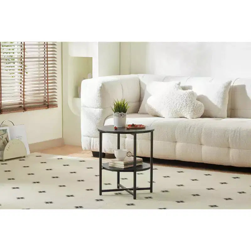 Table d'appoint ronde Okak Farmhouse avec pieds croisés, table d'appoint avec étagère inférieure, table de canapé pour salon, chambre, noir