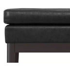 Banc repose-pieds étroit Bragg de 68,5 cm de large, style Mid-Century, en similicuir végan vieilli noir