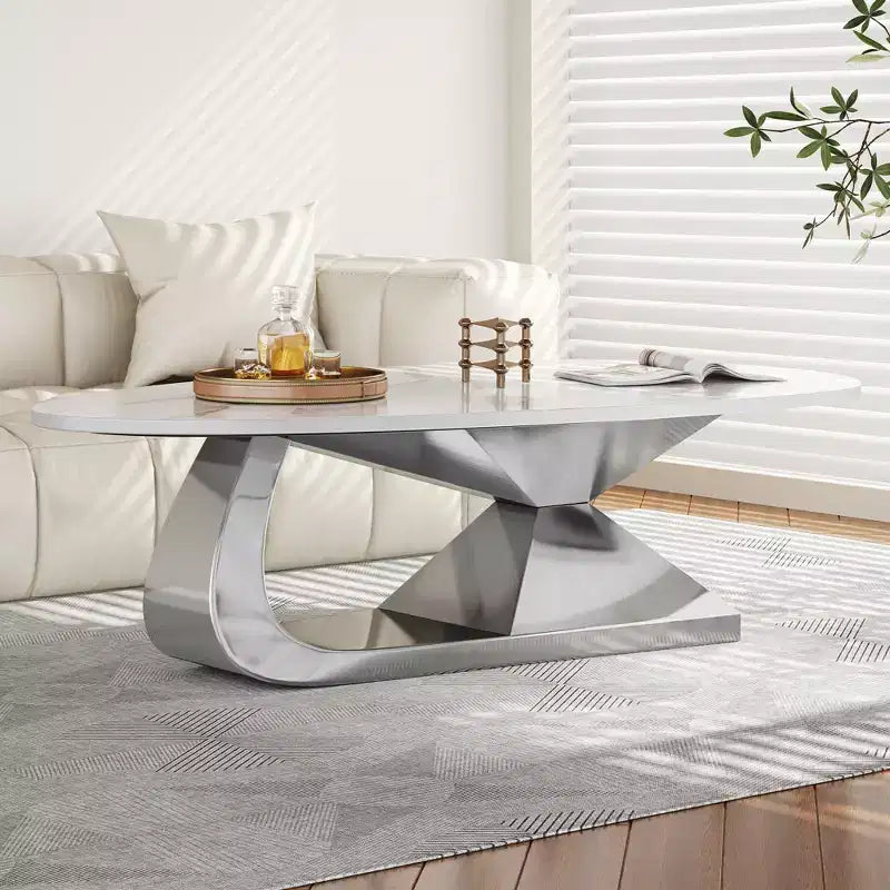 Table basse à plateau en céramique avec piètement contemporain en acier inoxydable - Une pièce maîtresse durable et élégante pour votre salon.