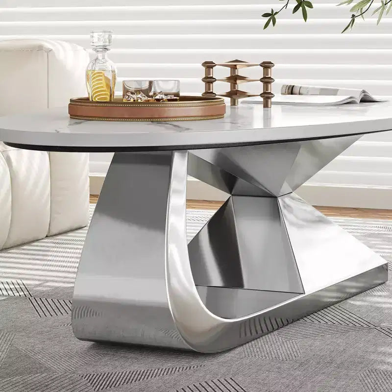 Table basse à plateau en céramique avec piètement contemporain en acier inoxydable - Une pièce maîtresse durable et élégante pour votre salon.