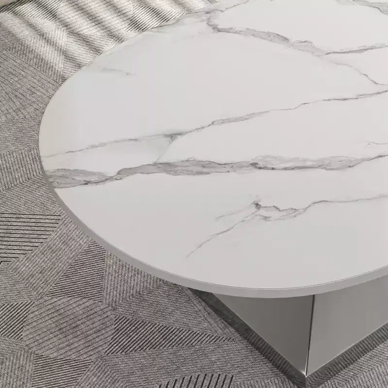 Table basse à plateau en céramique avec piètement contemporain en acier inoxydable - Une pièce maîtresse durable et élégante pour votre salon.