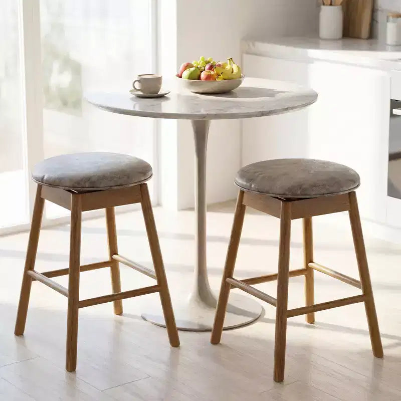 Lot de 4 tabourets de bar pivotants Costway 63,5 cm avec pieds en bois massif et repose-pieds