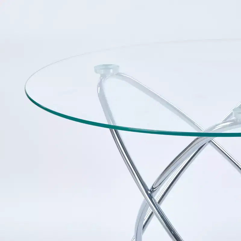 Table à manger avec pied en métal chromé et plateau en verre trempé, design moderne et compact pour la cuisine ou le salon