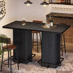 Table de bar carrée Lantine, table de bistrot/pub haute de 99,99 cm en bois avec repose-pieds en métal pour salle à manger, café, cocktail, salon, petits espaces